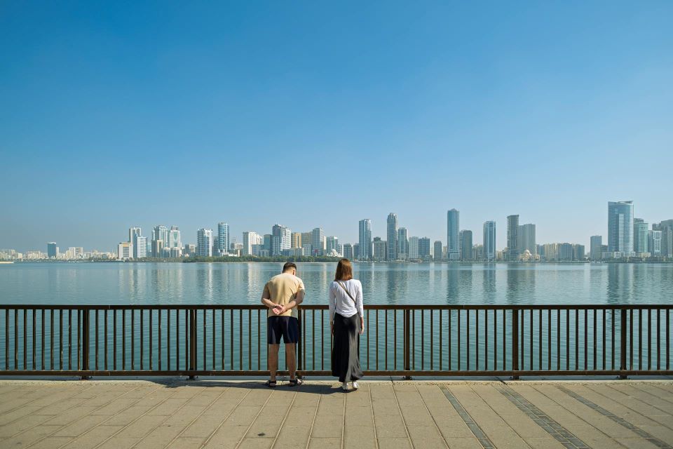A couple by the waterfront in Sharjah